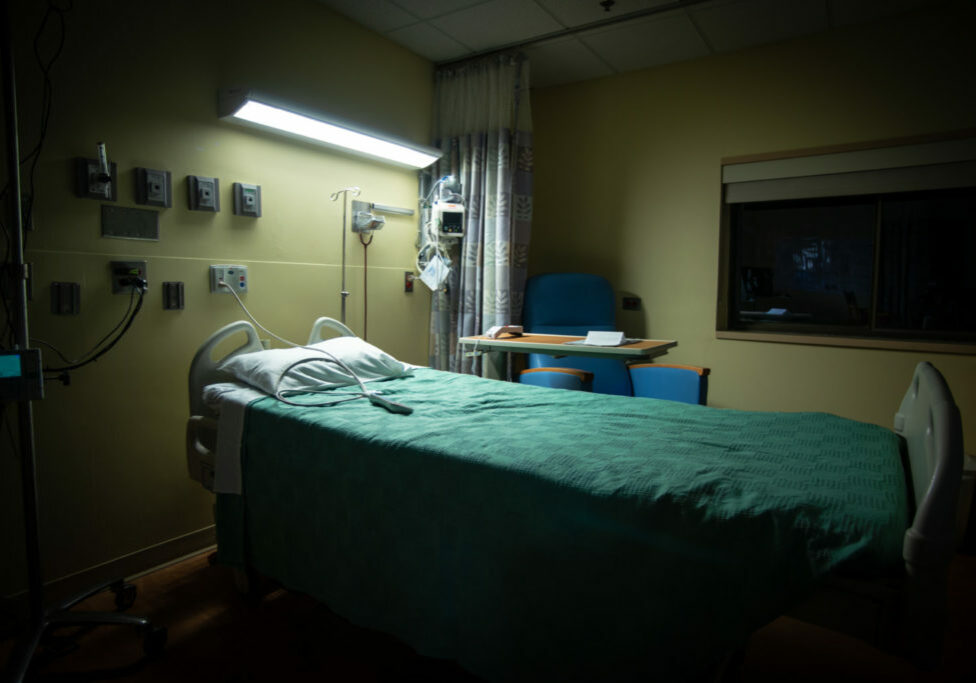 An empty hospital room is ready for the next patient.